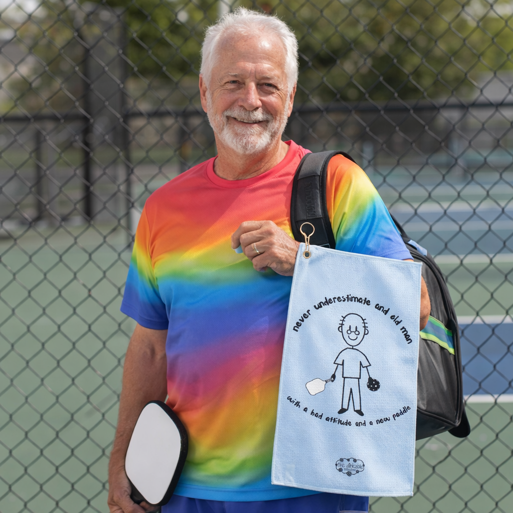Pickleball Graphic Golf Towel — “NEVER UNDERESTIMATE AN OLD MAN WITH A NEW PADDLE !” Lightweight Hanging Towel for Courts & Courses